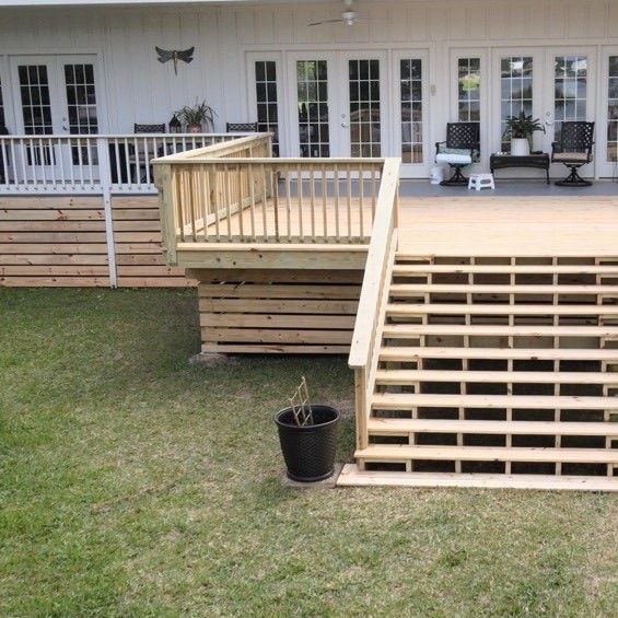 A deck built into the back of a house